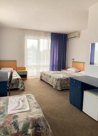 Imagen de la habitación del Hotel Mint Family Hotel. Foto 19