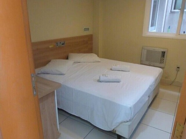 Imagen de la habitación del Hotel Minuano Home. Foto 16