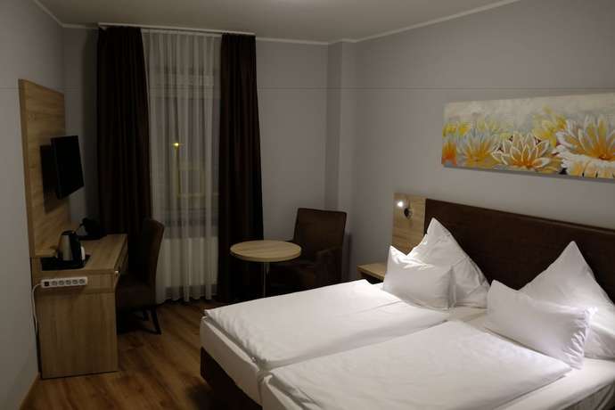 Imagen de la habitación del Hotel Minx - CityHotels. Foto 11