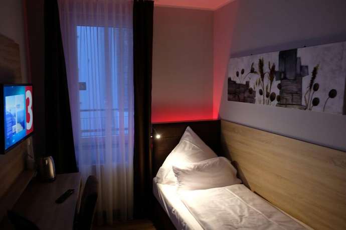 Imagen de la habitación del Hotel Minx - CityHotels. Foto 18