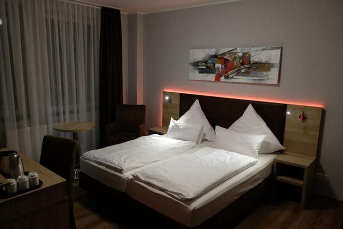 Imagen de la habitación del Hotel Minx - CityHotels. Foto 19