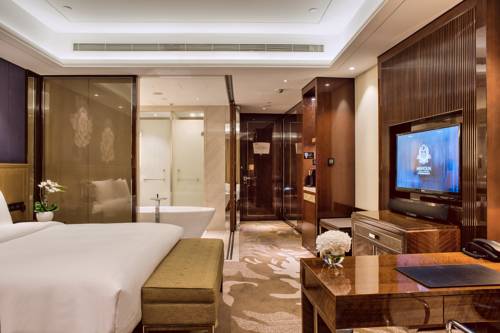 Imagen de la habitación del Hotel Minyoun Chengdu Dongda. Foto 8