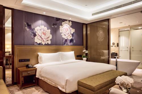 Imagen de la habitación del Hotel Minyoun Chengdu Dongda. Foto 13