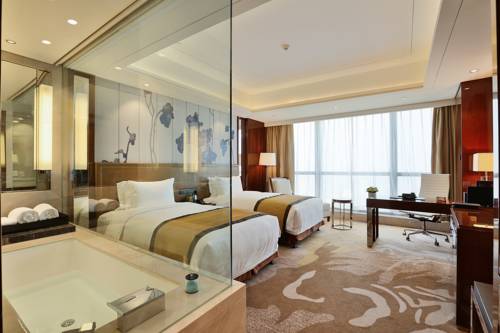 Imagen de la habitación del Hotel Minyoun Chengdu Dongda. Foto 15