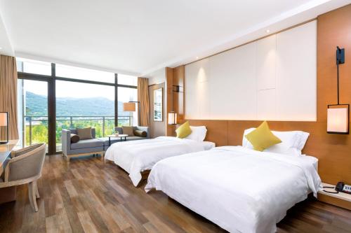 Imagen de la habitación del Hotel Minyoun Langzhong Ancient City Resort. Foto 7