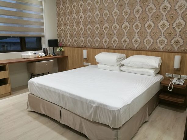 Imagen de la habitación del Hotel Minzu. Foto 3