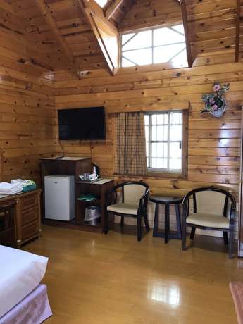Imagen de la habitación del Hotel Minzu. Foto 10