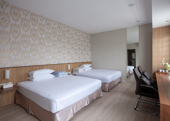 Imagen de la habitación del Hotel Minzu. Foto 11