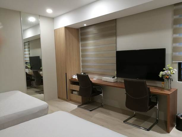 Imagen de la habitación del Hotel Minzu. Foto 12