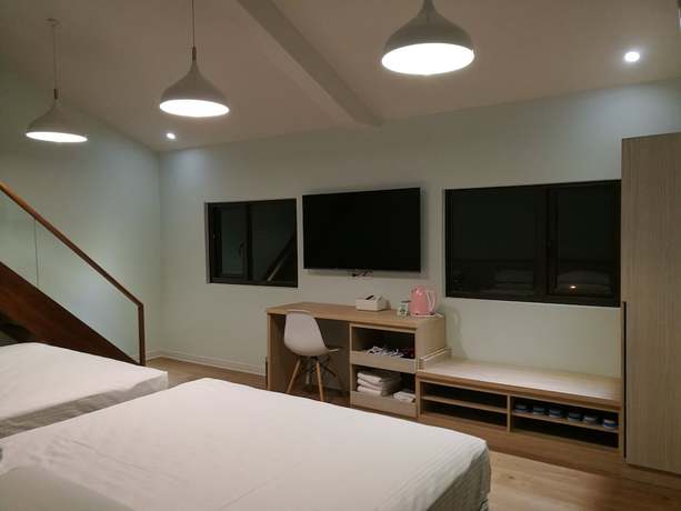 Imagen de la habitación del Hotel Minzu. Foto 13
