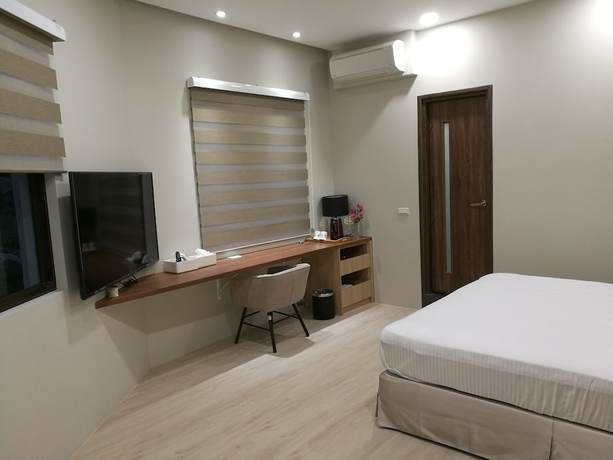 Imagen de la habitación del Hotel Minzu. Foto 20