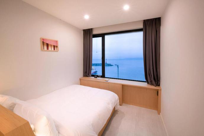 Imagen de la habitación del Hotel Mipo Oceanside. Foto 4