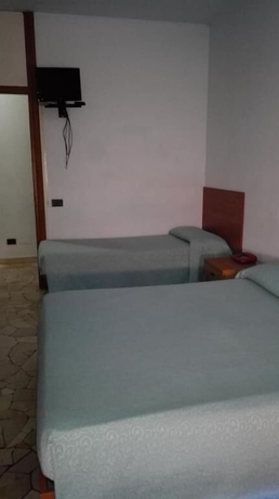Imagen de la habitación del Hotel Mira, Biumo Superiore. Foto 12