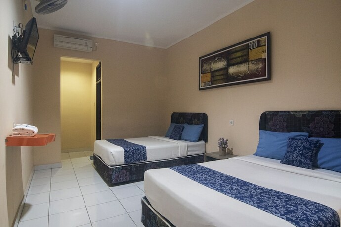 Imagen de la habitación del Hotel Miraa Guest House and Resto. Foto 19
