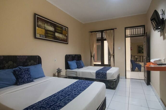 Imagen de la habitación del Hotel Miraa Guest House and Resto. Foto 20
