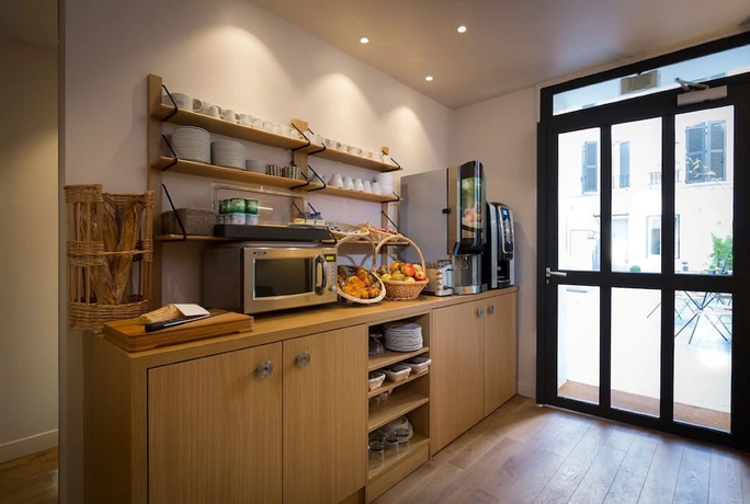 Imagen del bar/restaurante del Hotel Mirabeau Eiffel. Foto 3