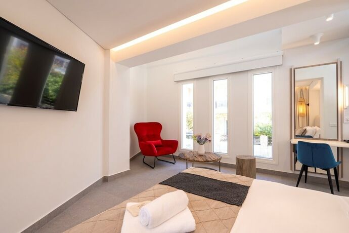 Imagen de la habitación del Hotel Mirablue Luxury Residences. Foto 12