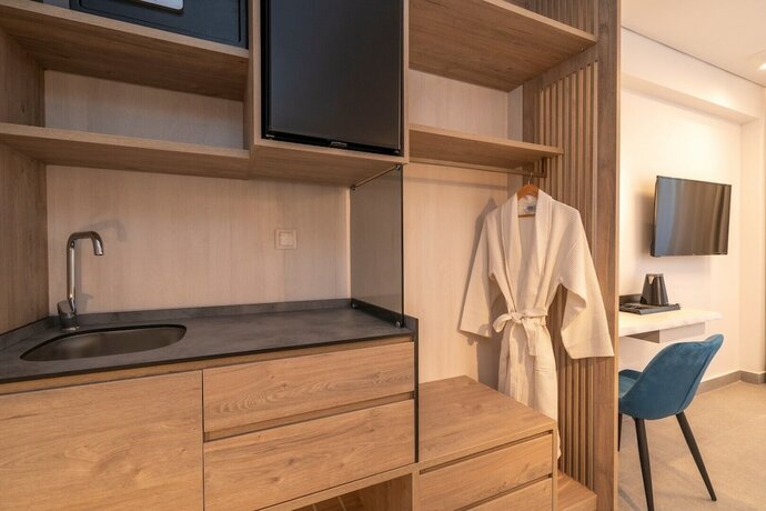 Imagen de la habitación del Hotel Mirablue Luxury Residences. Foto 19