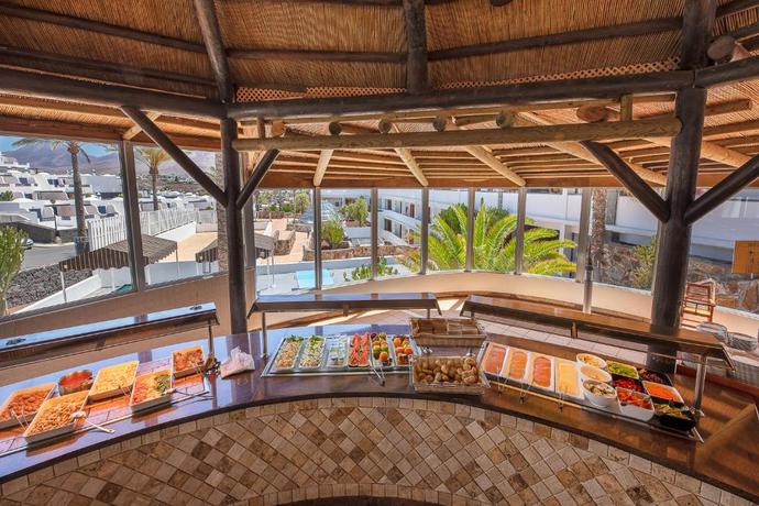 Imagen del bar/restaurante del Hotel Mirador Papagayo by LIVVO. Foto 3