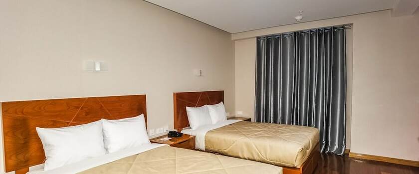 Imagen de la habitación del Hotel Miraflores City. Foto 11