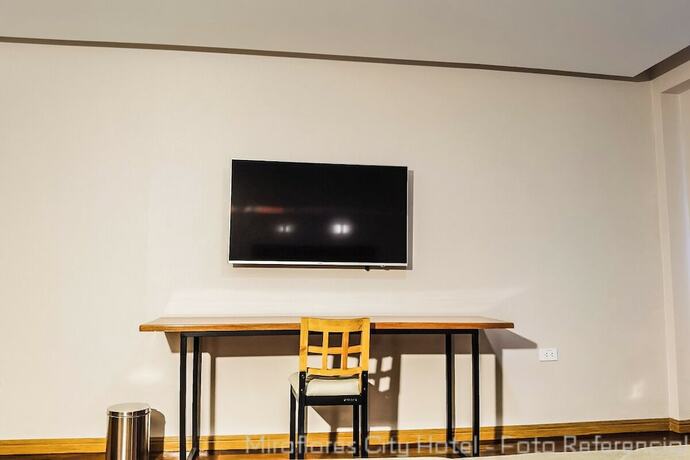 Imagen de la habitación del Hotel Miraflores City. Foto 17