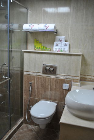 Imagen de la habitación del Hotel Mirage Al Aqah. Foto 3