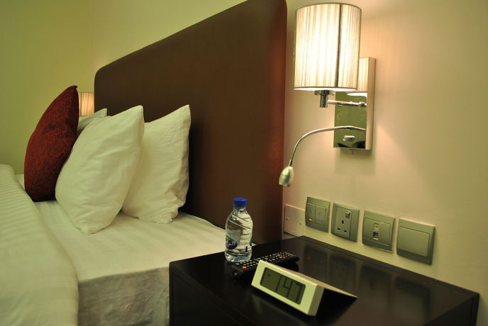 Imagen de la habitación del Hotel Mirage Al Aqah. Foto 8