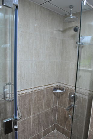 Imagen de la habitación del Hotel Mirage Al Aqah. Foto 9