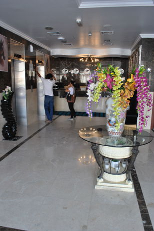 Imagen de la habitación del Hotel Mirage Al Aqah. Foto 13
