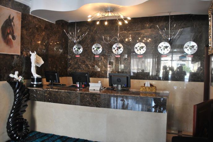 Imagen de la habitación del Hotel Mirage Al Aqah. Foto 14
