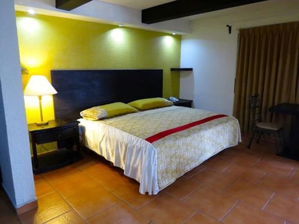 Imagen de la habitación del Hotel Mirage Express. Foto 11