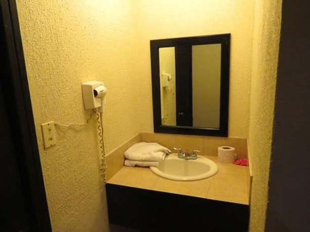 Imagen de la habitación del Hotel Mirage Express. Foto 13