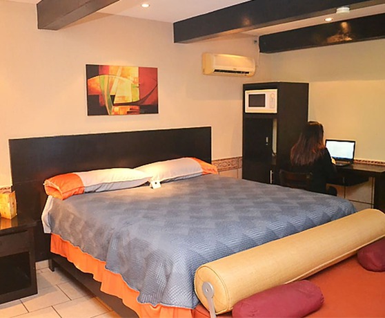 Imagen de la habitación del Hotel Mirage Express. Foto 14