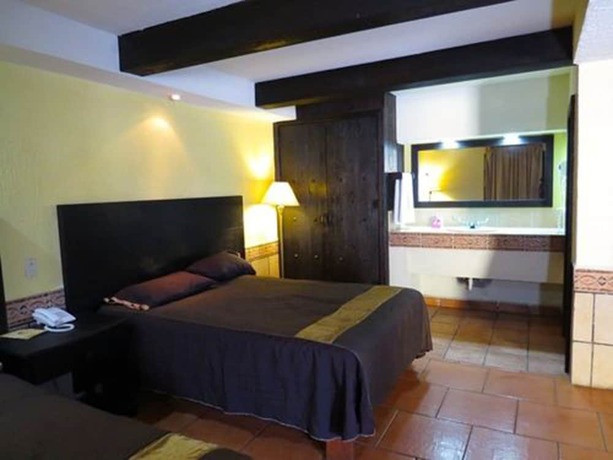 Imagen de la habitación del Hotel Mirage Express. Foto 17