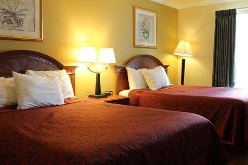 Imagen de la habitación del Hotel Mirage Inn and Suites. Foto 2