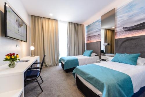 Imagen de la habitación del Hotel Mirage Medspa. Foto 6