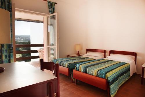 Imagen de la habitación del Hotel Mirage, Santa Teresa Gallura. Foto 9