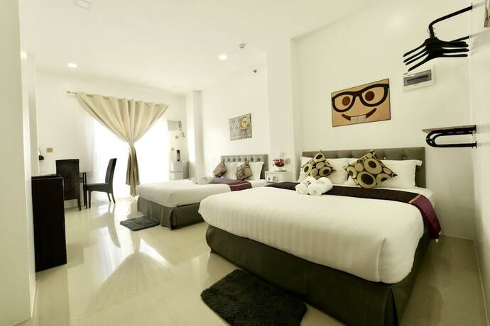 Imagen de la habitación del Hotel Mirage Suites De Boracay. Foto 15