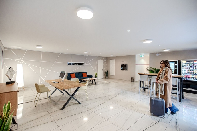 Imagen de los interiores del Hotel Miralago Locarno Easy Rooms. Foto 11