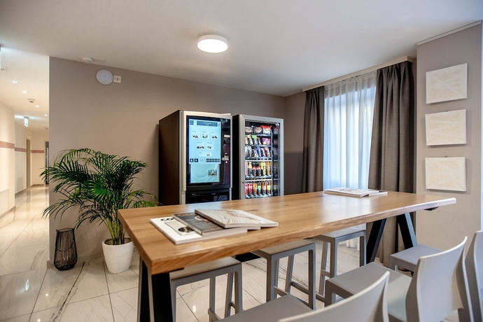 Imagen de los interiores del Hotel Miralago Locarno Easy Rooms. Foto 17