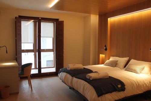 Imagen de la habitación del Hotel Miralrio Cacabelos. Foto 7