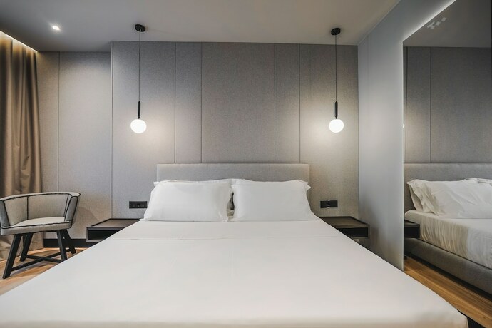 Imagen de la habitación del Hotel Miramare Boutique. Foto 18