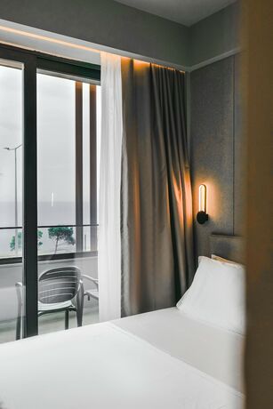 Imagen de la habitación del Hotel Miramare Boutique. Foto 19