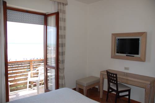 Imagen de la habitación del Hotel Miramare, Castiglione della Pescaia. Foto 8