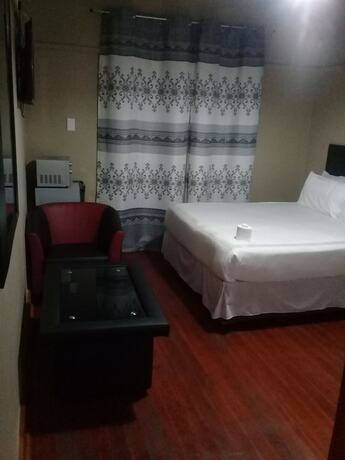 Imagen de la habitación del Hotel Miraton Eastgate Suites. Foto 16