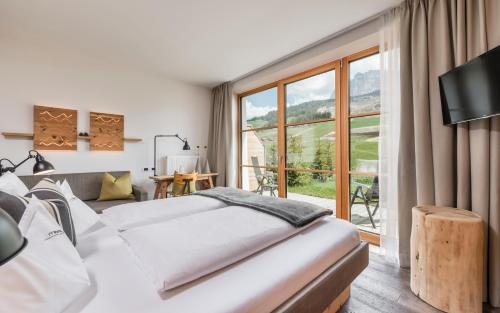 Imagen de la habitación del Hotel Miraval NaturHotel. Foto 9