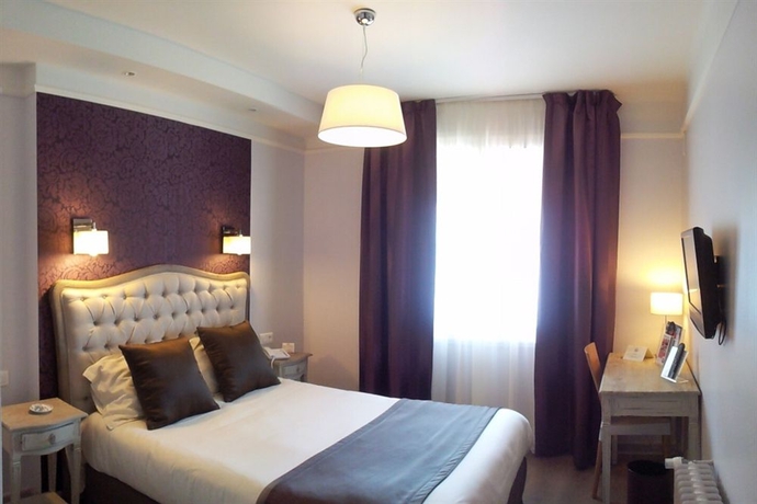 Imagen de la habitación del Hotel Mireille. Foto 4