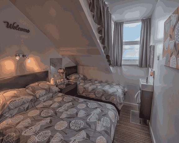 Imagen de la habitación del Hotel Miricia Guest House. Foto 4