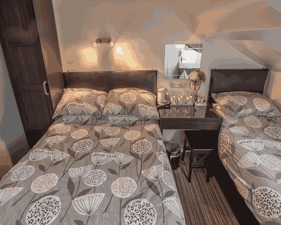 Imagen de la habitación del Hotel Miricia Guest House. Foto 5