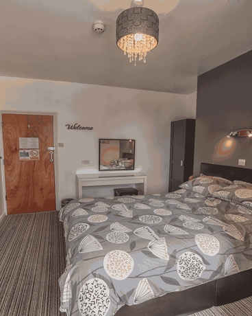 Imagen de la habitación del Hotel Miricia Guest House. Foto 6